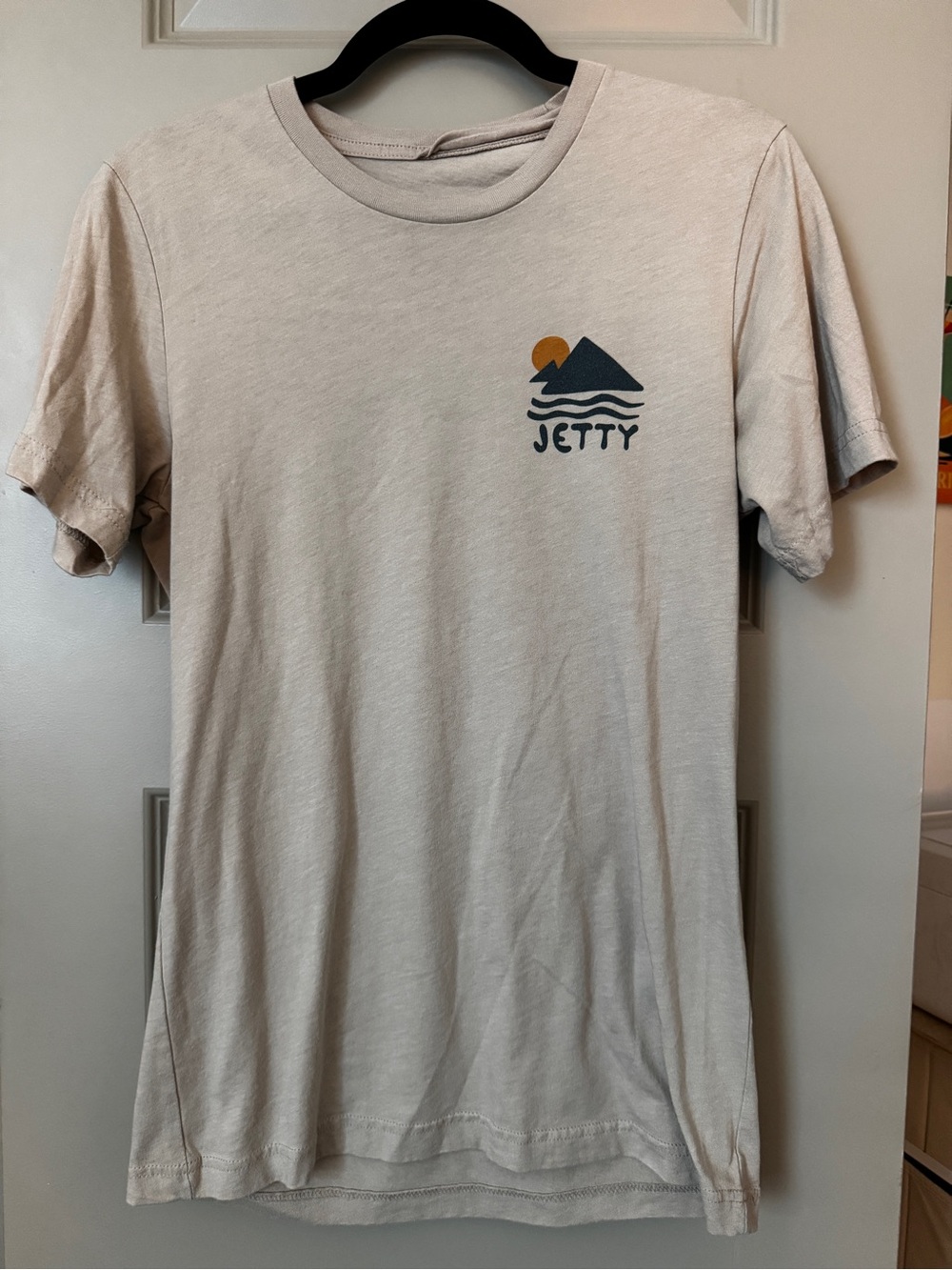 Jetty Men's Short-Sleeve Tee in Cream with Sunset Logo